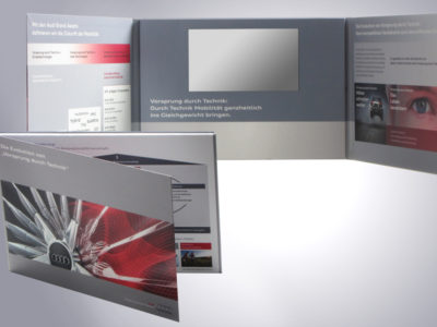audio-logo-gmbh-video-in-print-1004-Audi-Buch-400x300